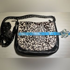 Michael Kors Hayes Messenger Bag with beautiful animal print hair-calf flap.